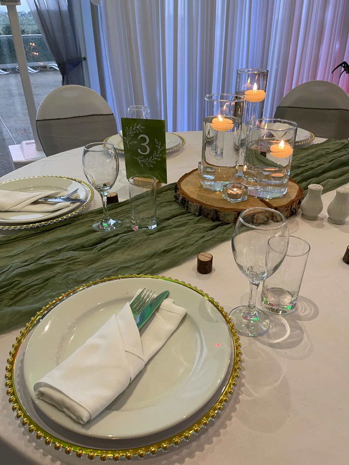 Sage green candle centrepiece